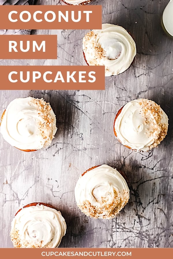 pinterest friendly coconut rum cupcakes on a table with a text overlay.