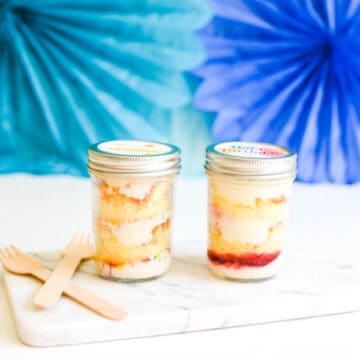 Side view of cupcakes in jars.