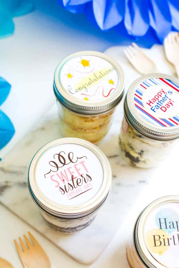 Close up of the lids for shipped cupcakes in jars.