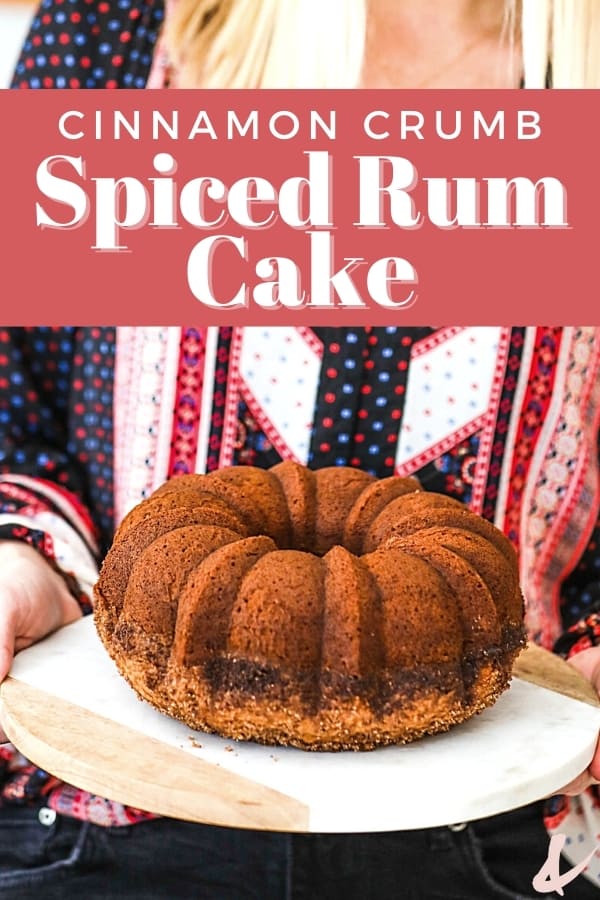 Woman holding a platter with a Rum Bundt Cake.