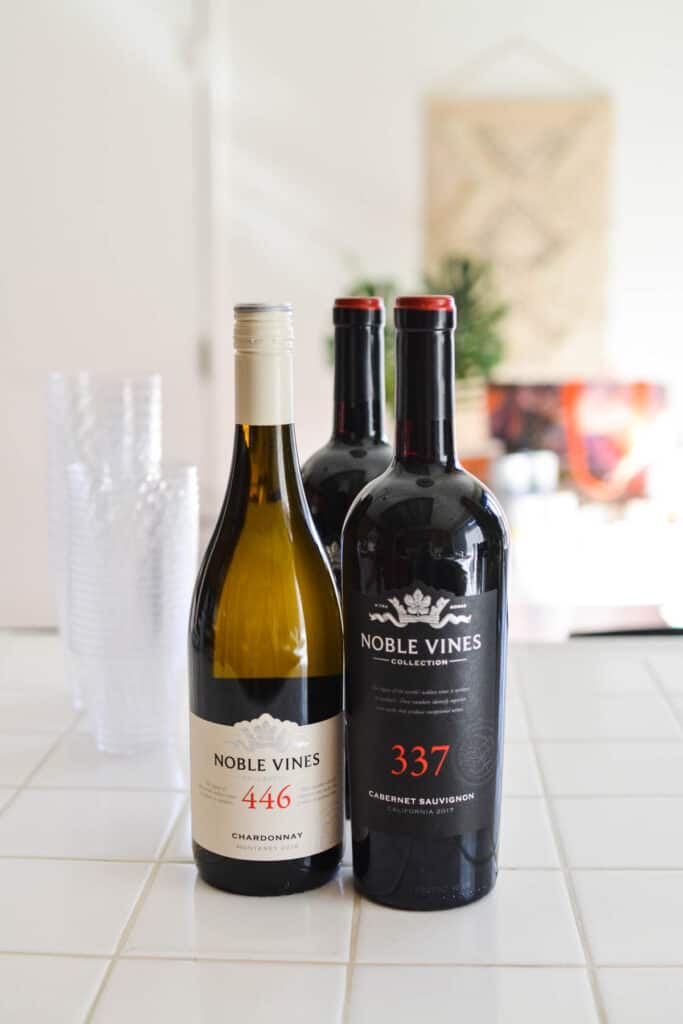 Red and white Noble Vines on a counter.