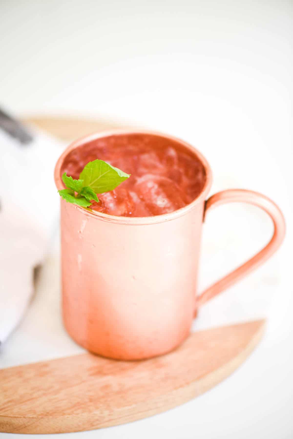 Strawberry Mule in a copper mug.