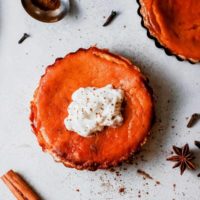 Overhead view of a Fireball Pumpkin Pie topped with whipped cream.