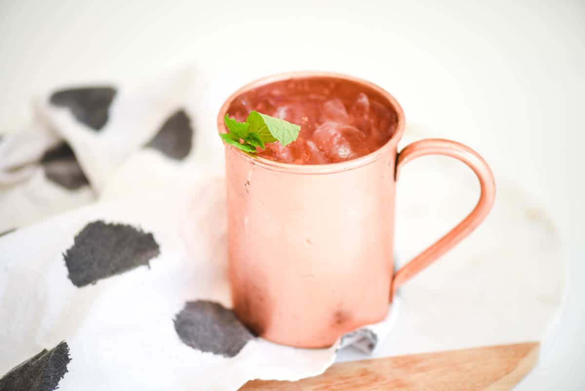 Copper Moscow Mule mug on a table.