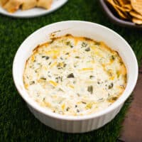 Close up of the top of a warm dip in a baking dish.