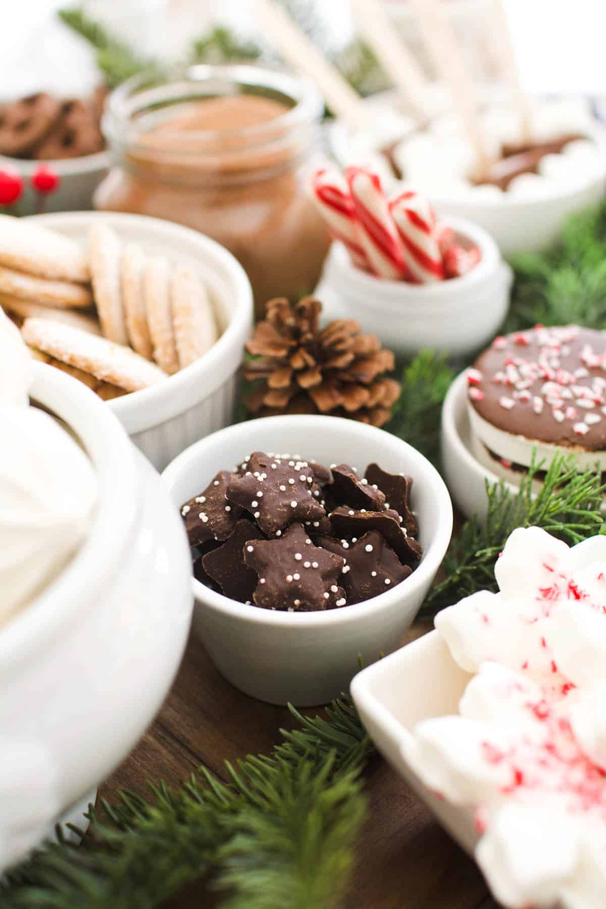 Close up of chocolate star cookies in a bowl on a tray.