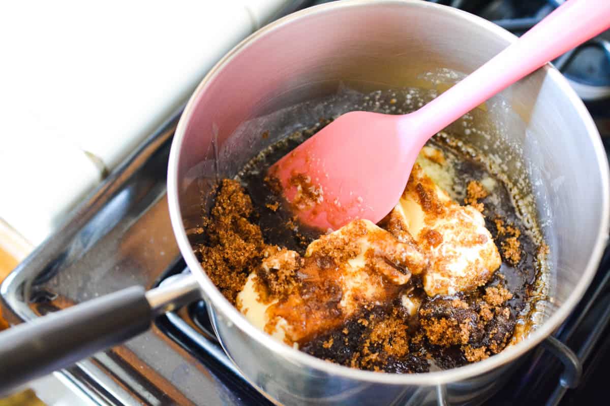 Ingredients for caramel corn in a pan on the stove.