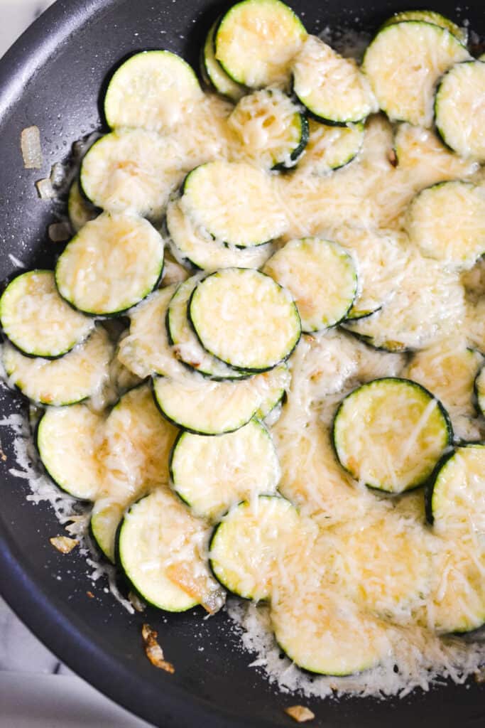 Parmesan Zucchini in a sautee pan.