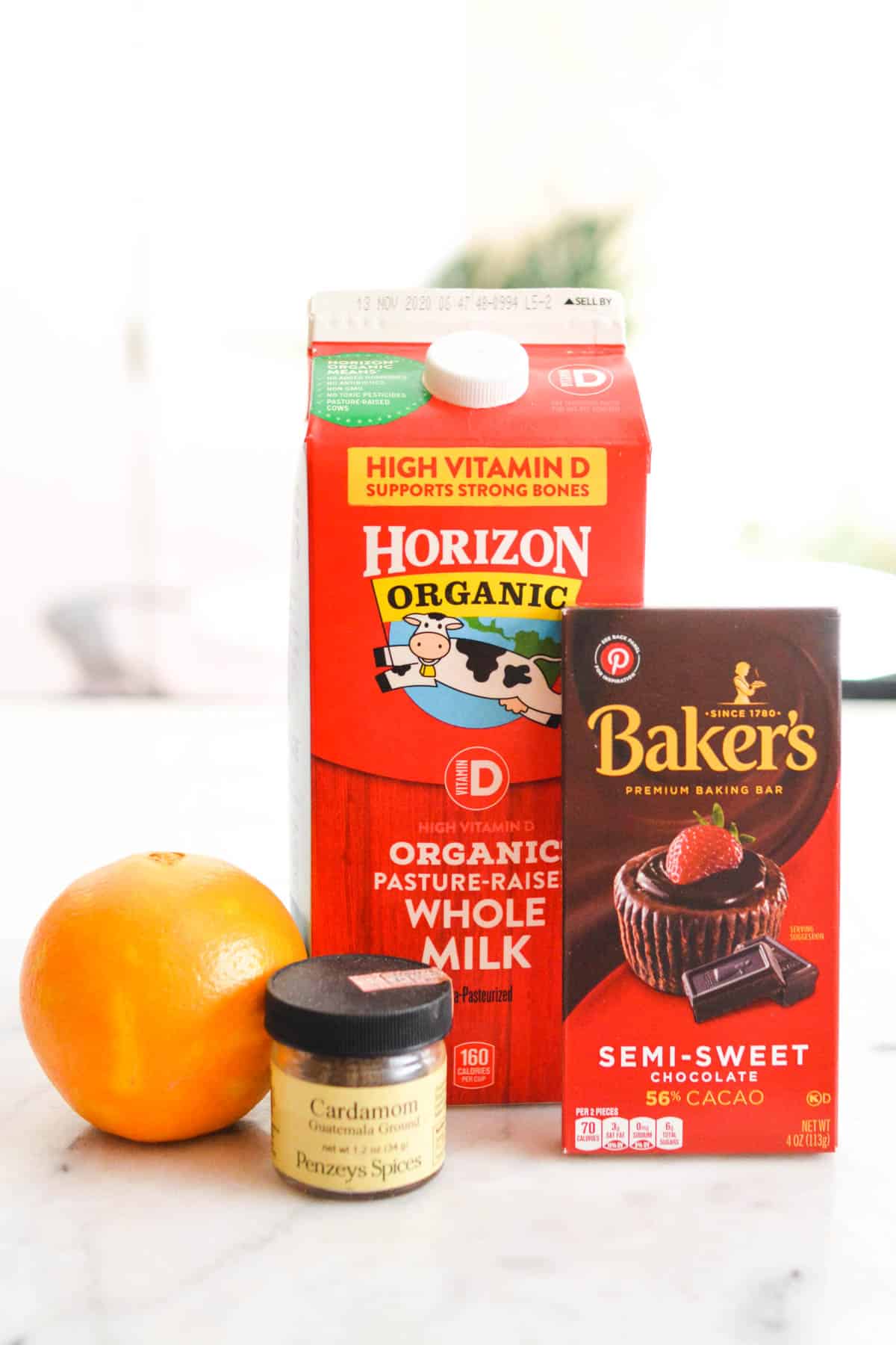Ingredients to make orange cardamom hot chocolate