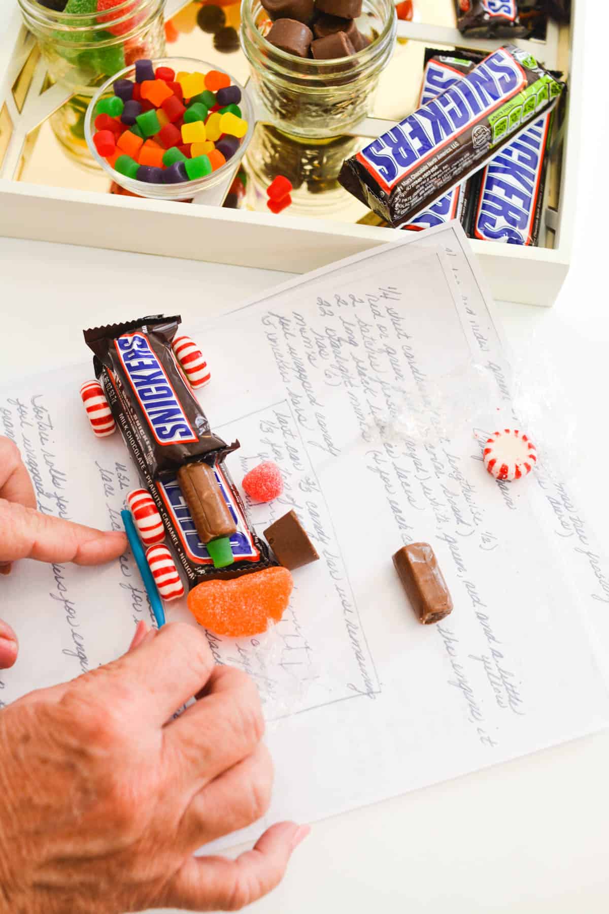 Creating a holiday train from a variety of candy.