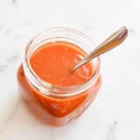 Close up of a jar holding tomato juice