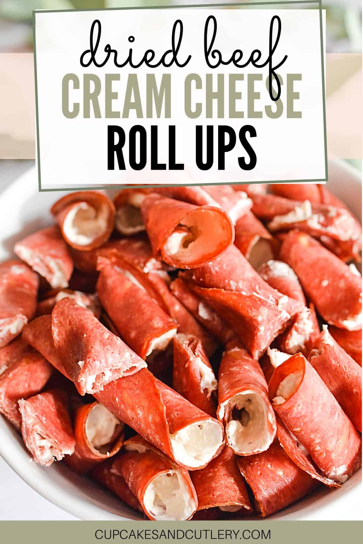 Close up of dried beef roll ups in a bowl.