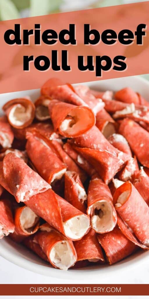 A close up of a bowl holding cut dried beef roll ups for a snack.