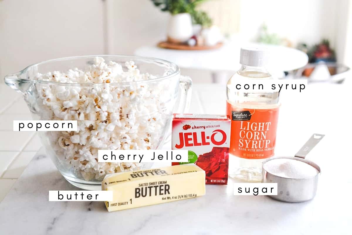 Labeled ingredients to make flavored popcorn with cherry jello