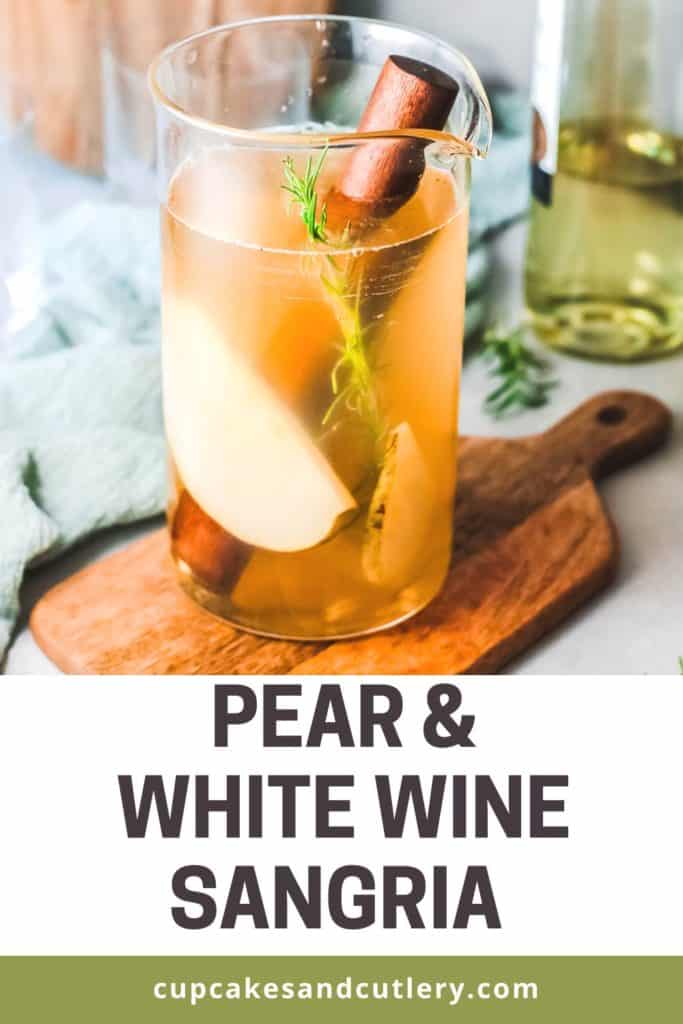 Pitcher of Sangria with White Wine and Pear with sliced pears and rosemary with text: Pear and white Wine Sangria, Cupcakes and Cutlery