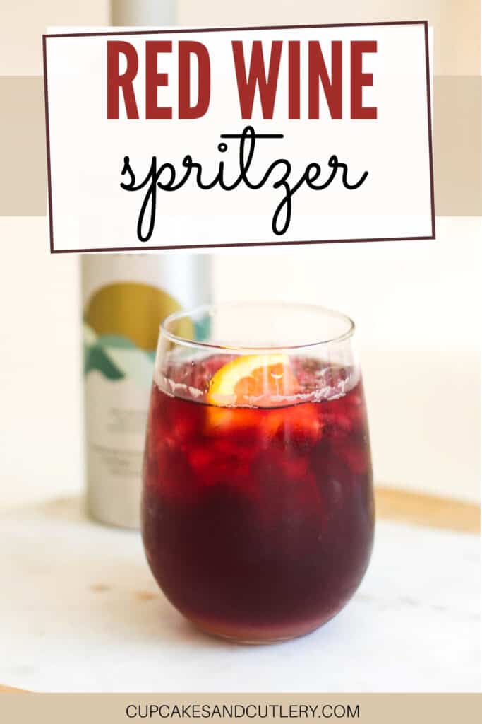 Close up of a red wine spritzer in a stemless wine glass.