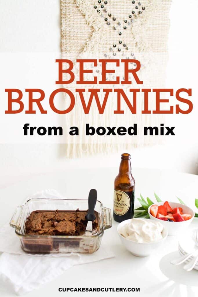 Image contains a dish of guinness brownies next to a bottle of beer and a bowl of whipped cream with text that reads Beer Brownies from a Boxed Mix.