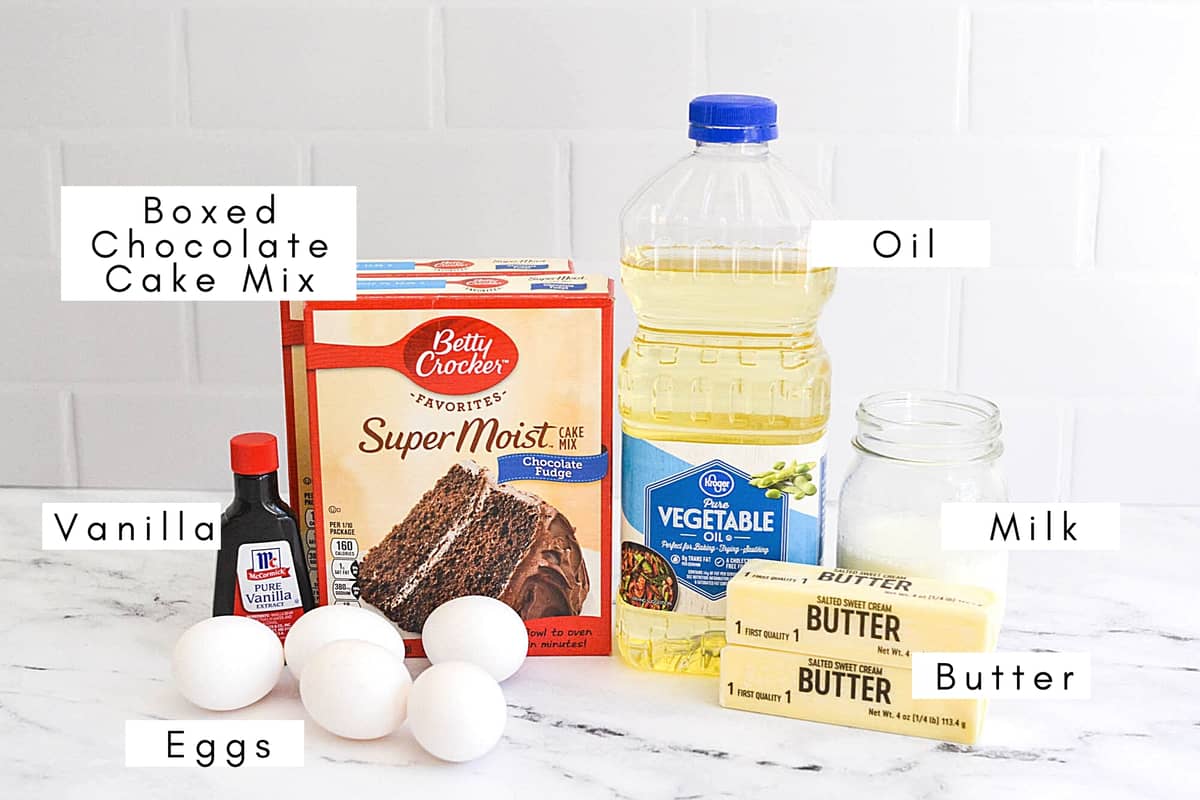 Labeled ingredients to make a layered Chocolate Truffle Cake from a boxed mix.