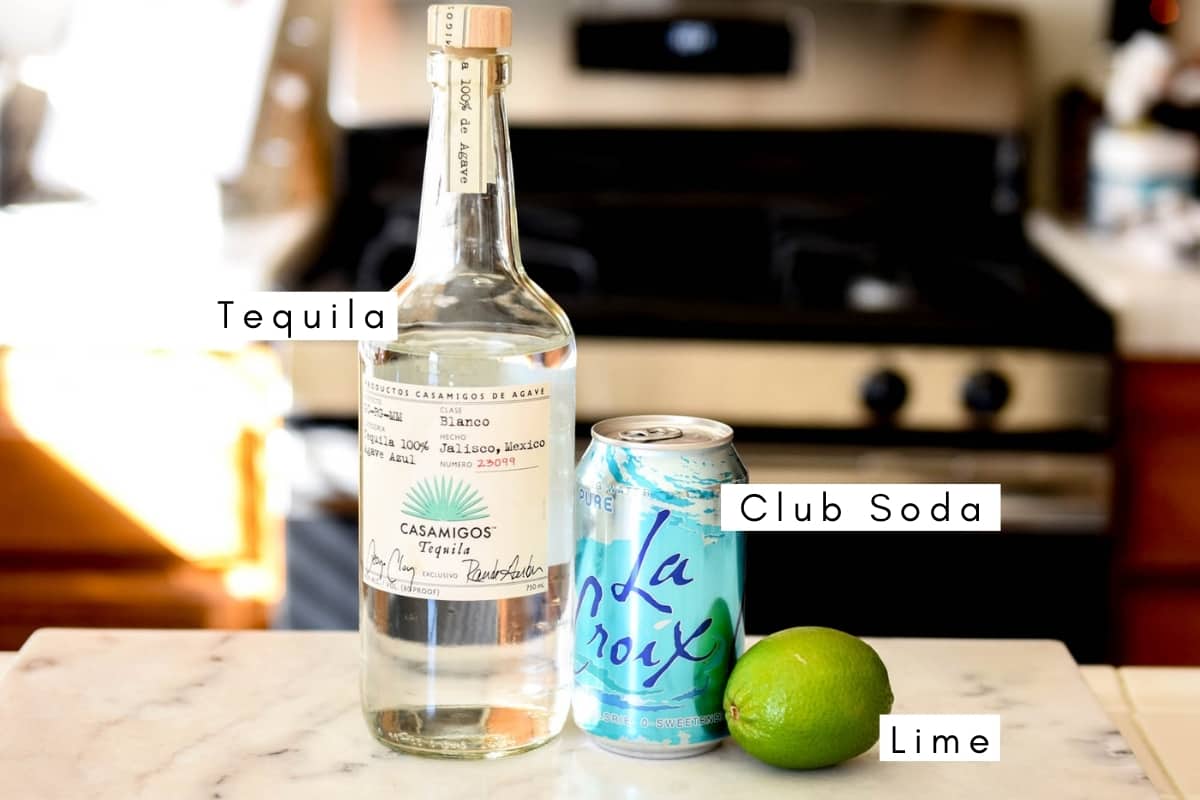 Labeled ingredients to make Tequila and Club Soda.