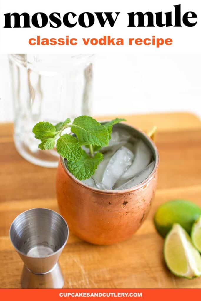 A copper mug on a counter with a Moscow Mule cocktail in it.