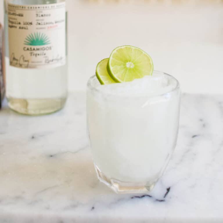 Margarita on the rocks in a short cocktail glass on a table.