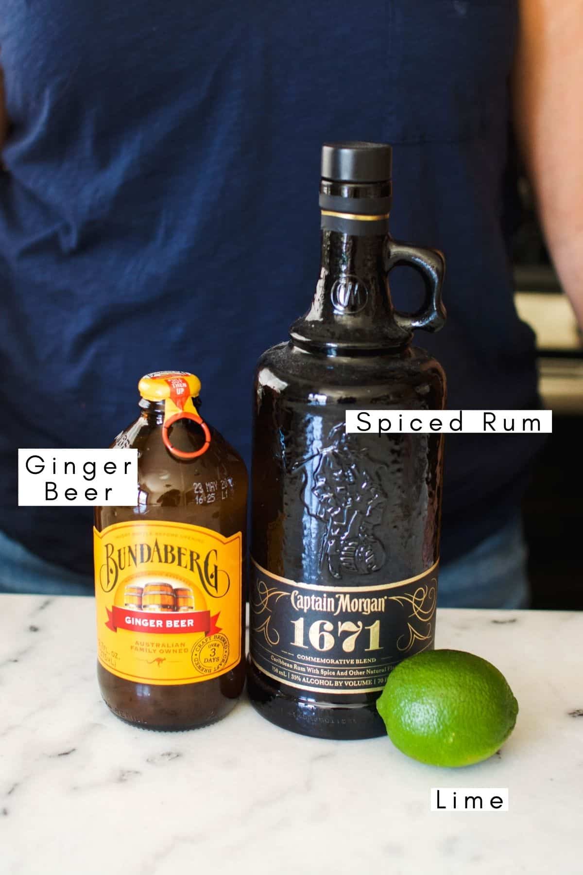Labeled ingredients to make a dark and stormy cocktail recipe.