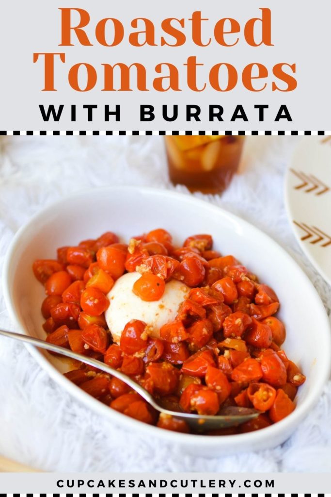 A white baking dish with burrata cheese and roasted tomatoes for an appetizer.