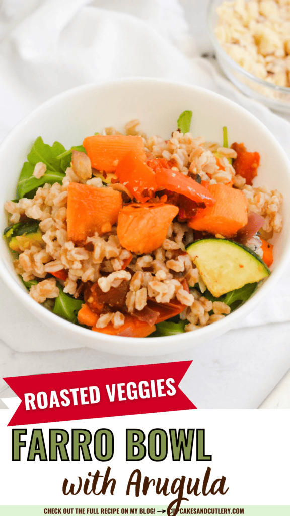 Text: Roasted Veggies Farro Bowl with Arugula with a bowl of farro topped with roasted veggies.