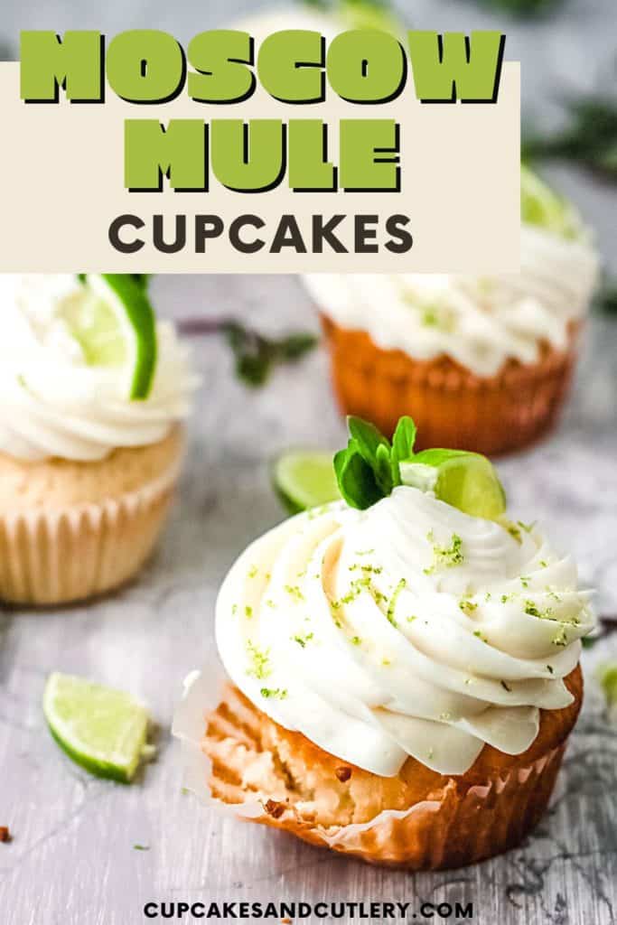 Close up of a Moscow mule cupcake garnished with mint and lime.