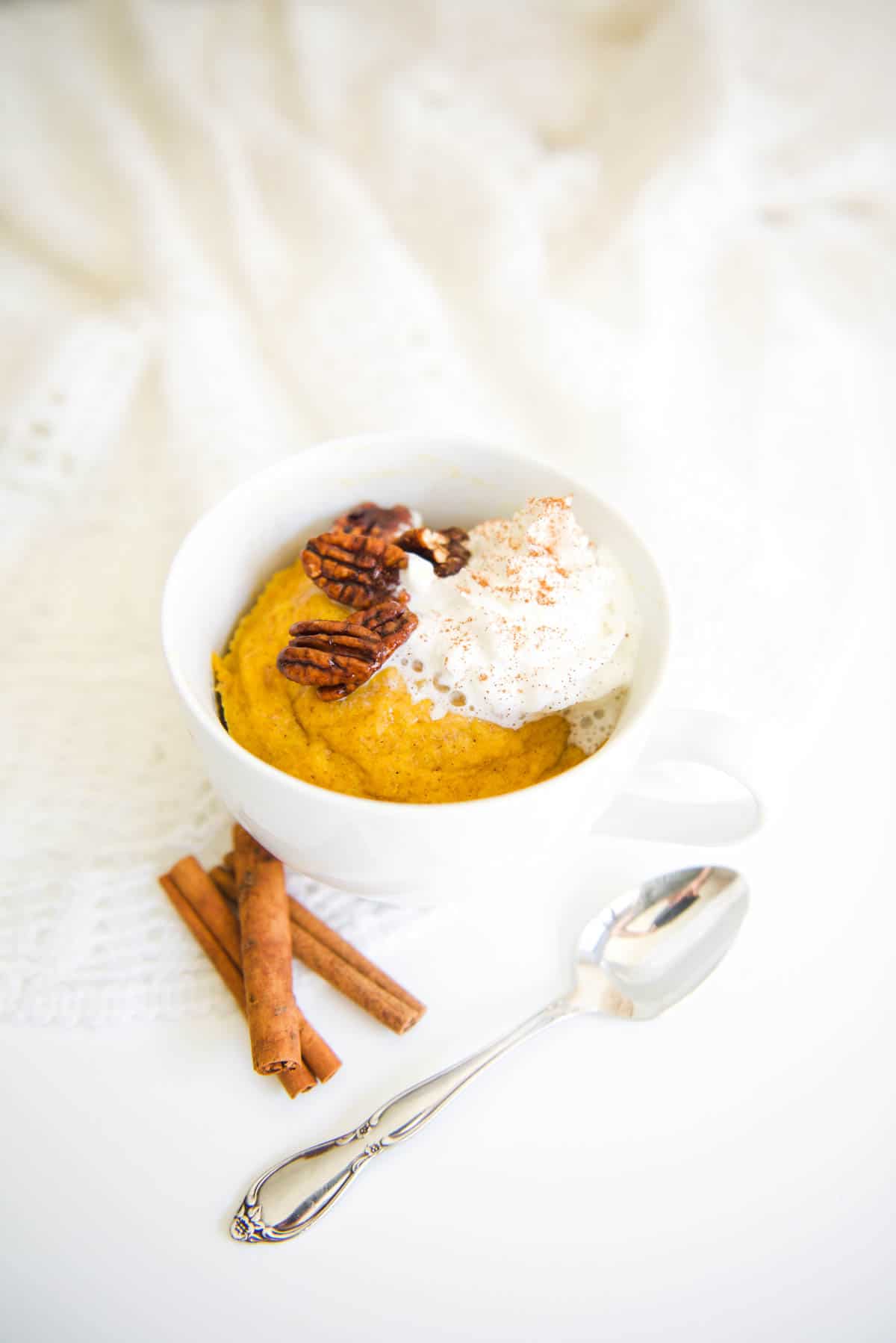 Finished shot of a pumpkin mug cake made in the microwave.