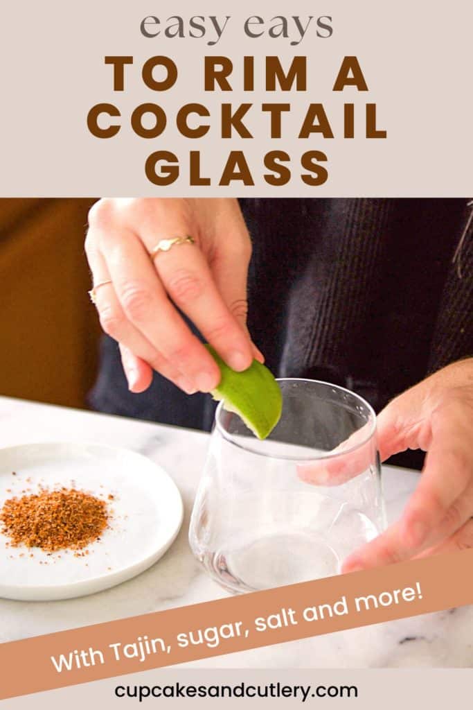 Woman rubbing a lime on the rim of a cocktail glass with a plate of Tajin next to it and text: Easy Ways to Rim a Cocktail Glass with Tajin salt sugar and more Cupcakes and Cutlery