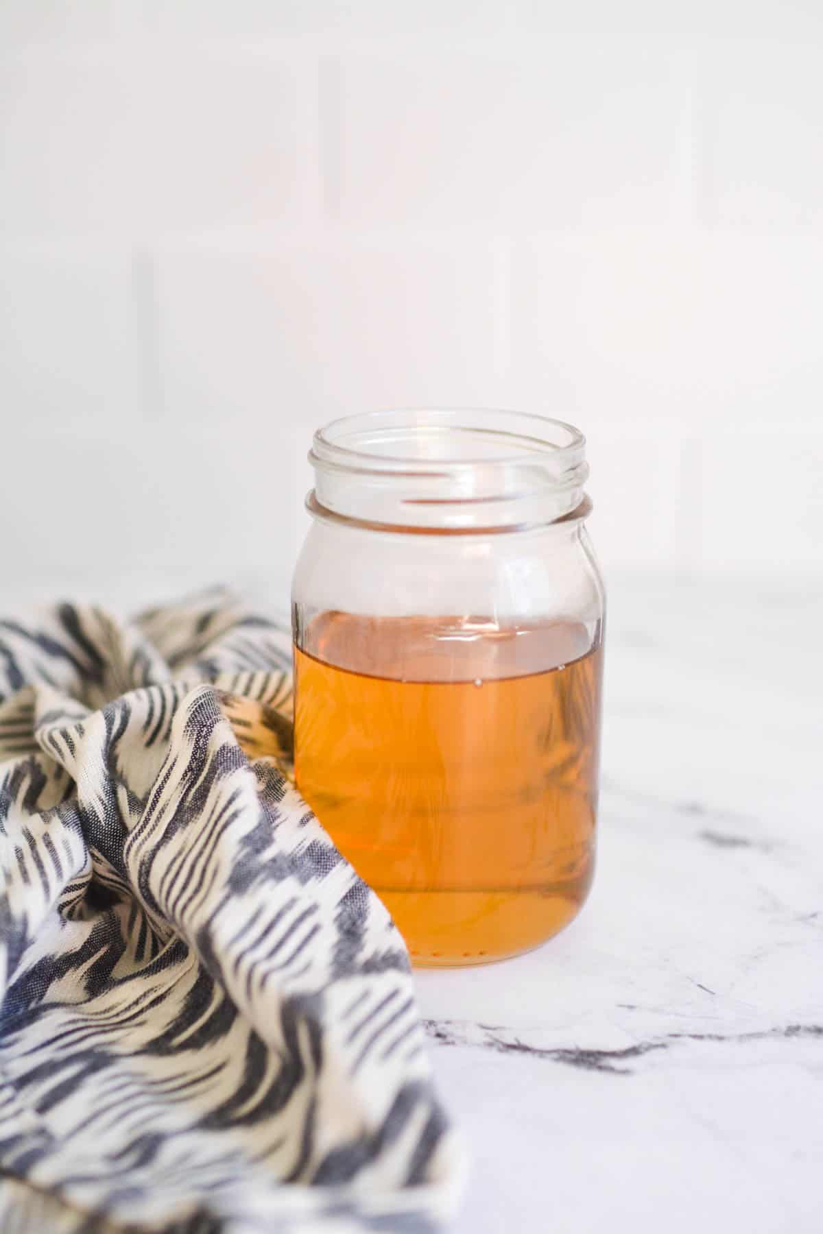 A jar of vanilla extract infused simple syrup.