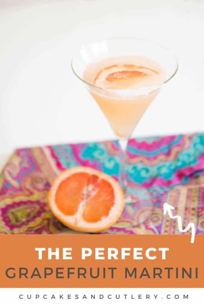 Text - The perfect grapefruit Martini over an image of a martini glass with a cocktail garnished with a slice of fresh grapefruit.