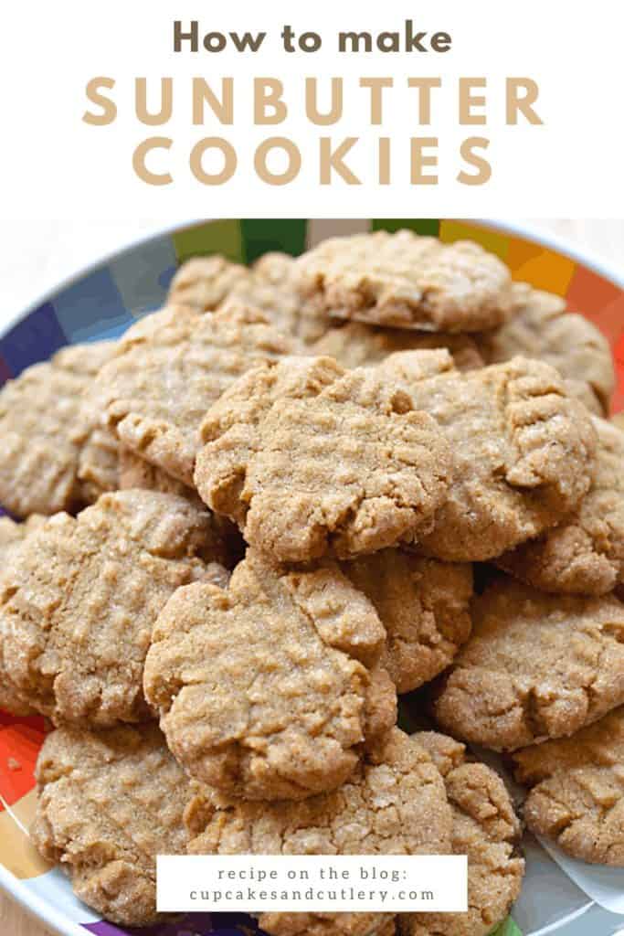 Close up of Sunbutter cookies rolled in sugar stacked on a plate.