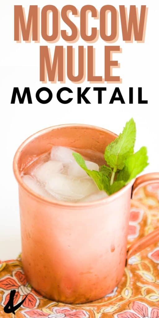Close up of a virgin Moscow Mule in a copper mug topped with fresh mint.