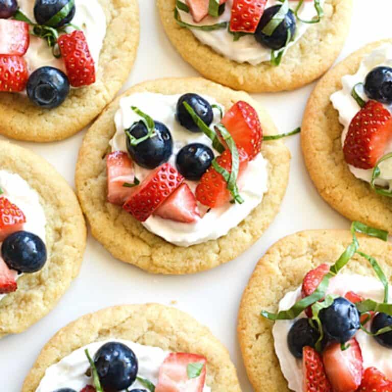 Close up of fruit bruschetta cookies on a plate.