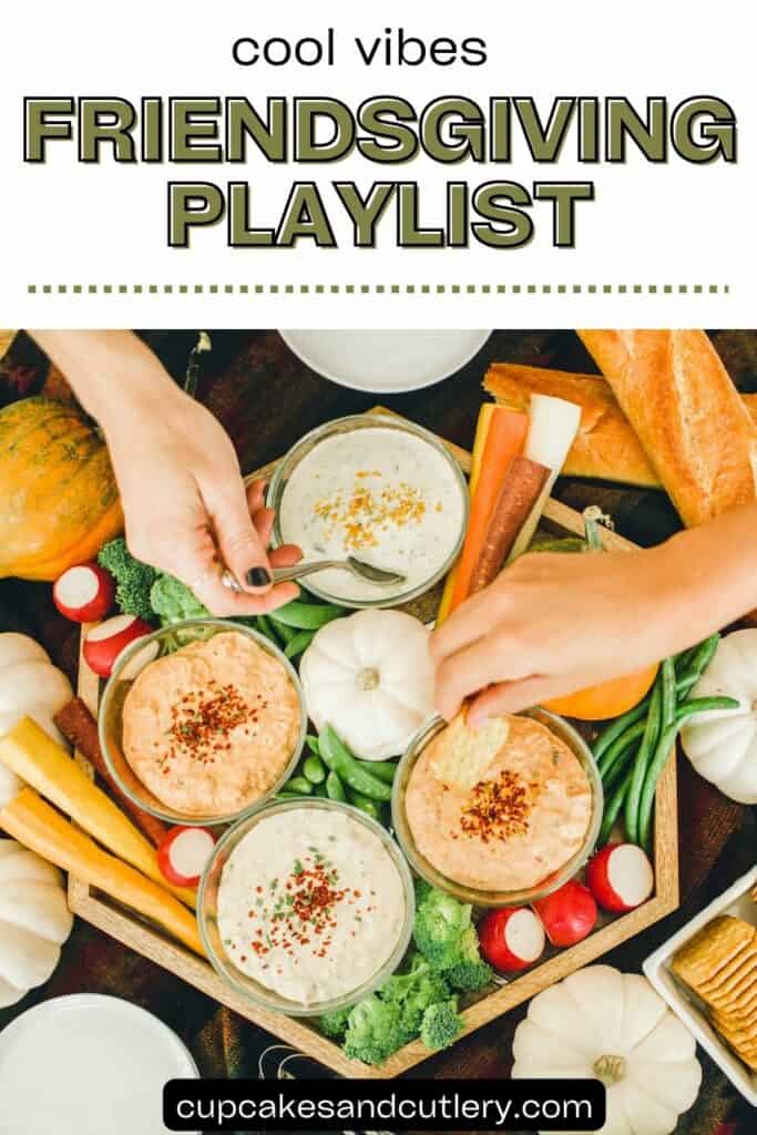 Text: Cool vibes Thanksgiving Playlist with a tray of dips, veggies and mini pumpkin.