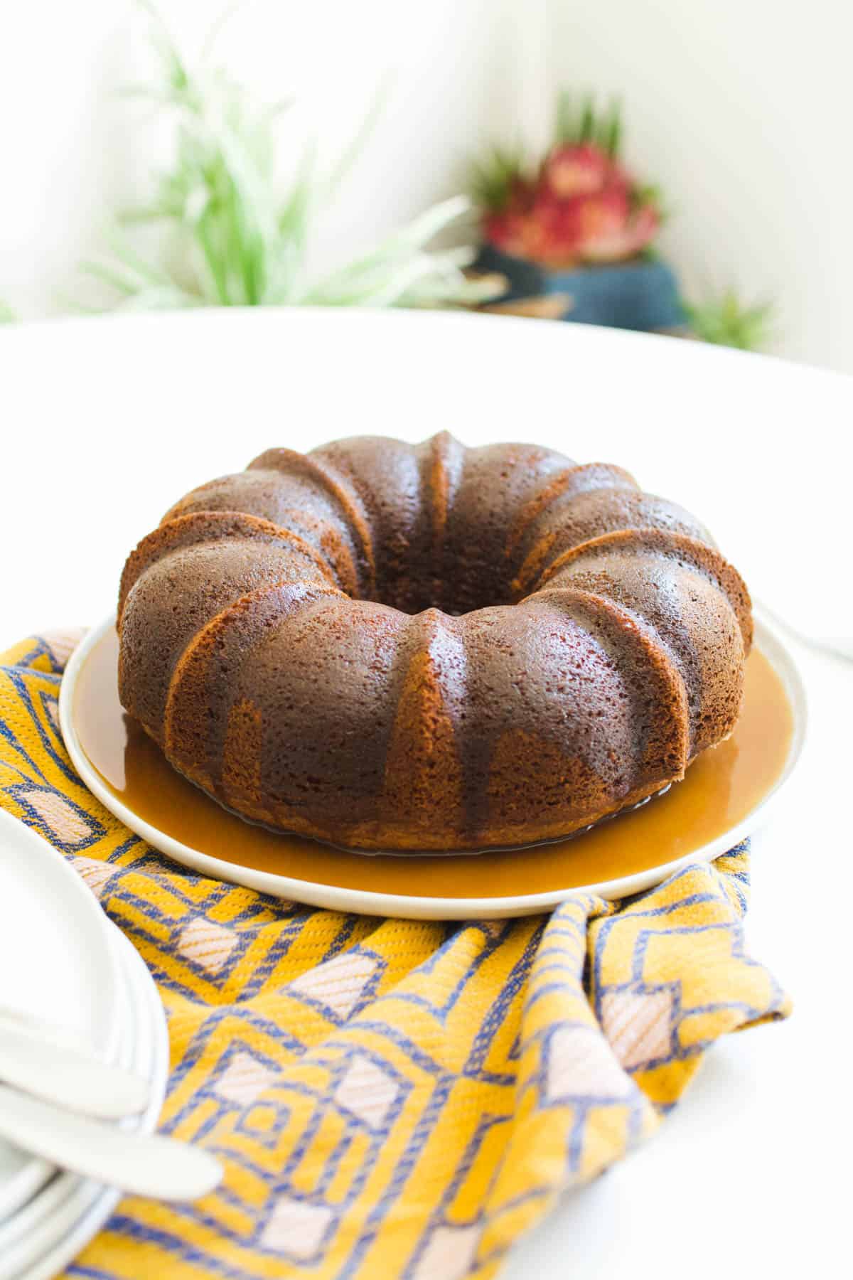 A bourbon bundt cake on a table.