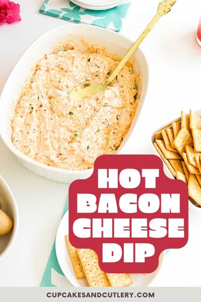 White serving dish of bacon cheese dip with a gold serving spoon.
