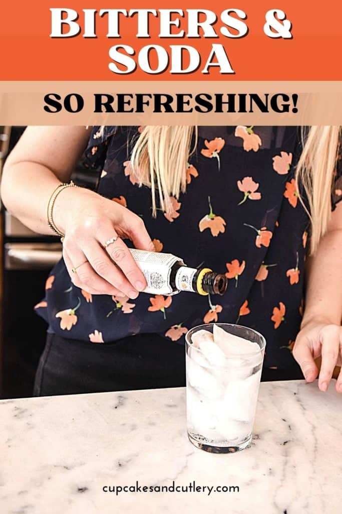Woman pouring bitters into a glass filled with club soda.