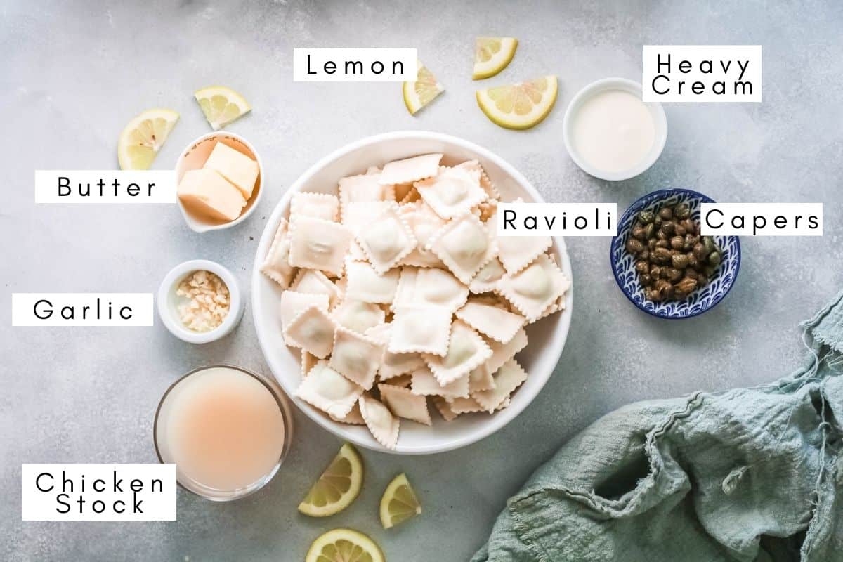 Labeled ingredients on a counter for ravioli with lemon cream sauce.