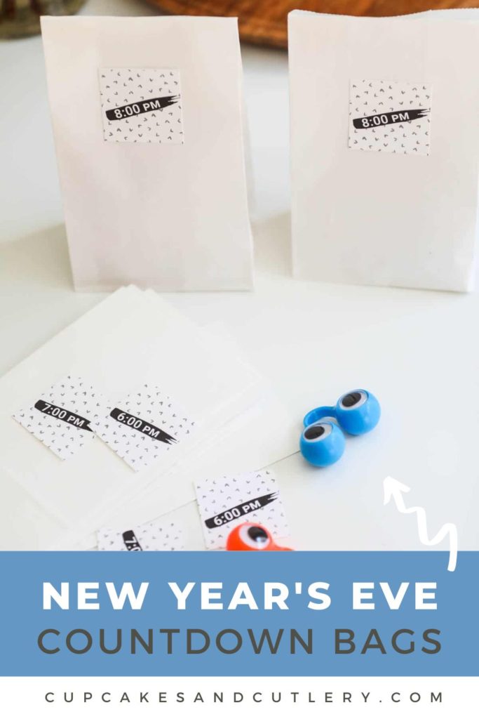 Text - New Year's Eve Countdown Bags with an image of white bags with times printed on them and a few toys next to them.