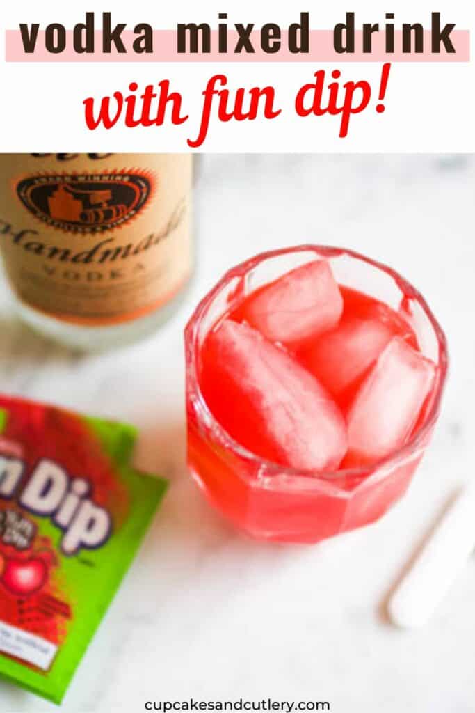 Text - Vodka mixed drink with fun dip with a bright pink cocktail on a table next to a bottle of vodka and a packet of Fun Dip.