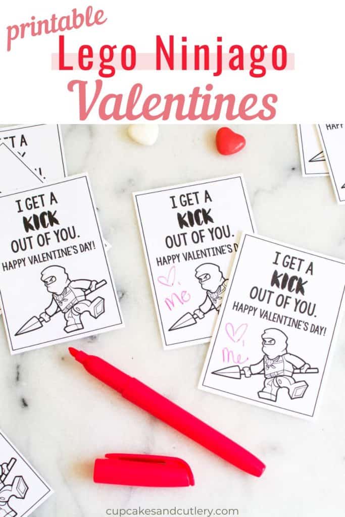 Text - Printable Lego Ninjago Valentines with an image of printed valentines with a Lego Ninjago character with a red pen laying on the counter.