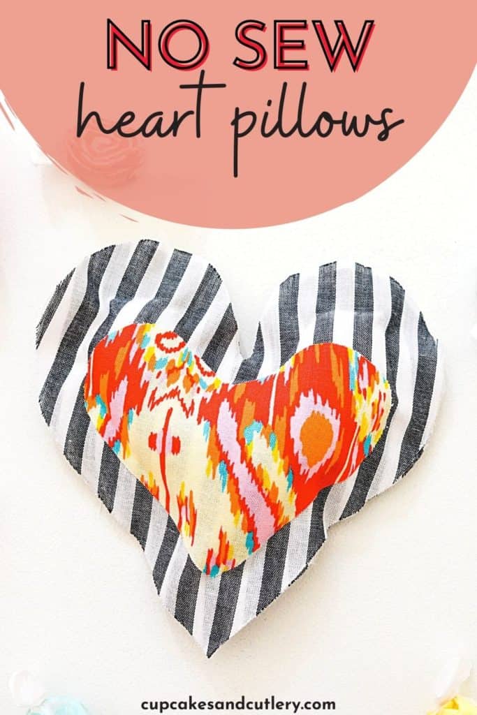 Text - No sew heart pillows with a fabric heart pillow laying on a white table.