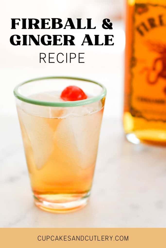 Fireball and ginger ale mixed drink in a glass with a cherry on top.