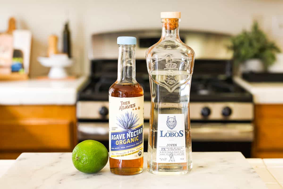 Ingredients to make a gimlet with tequila.