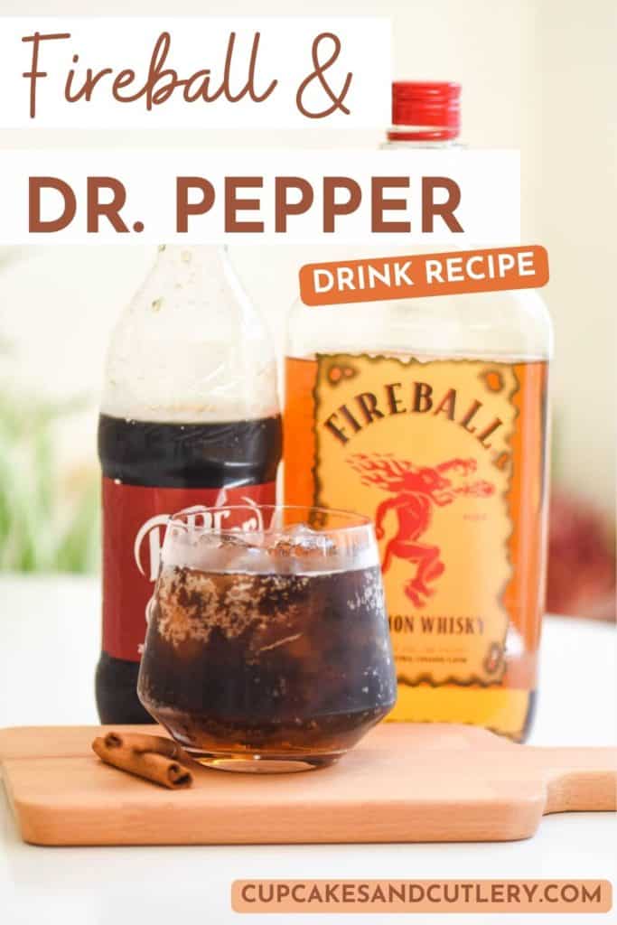 Text - Fireball and Dr. Pepper with a bottle of soda and Firebal whiskey in the background and a cocktail glass with cinnamon sticks next to it.