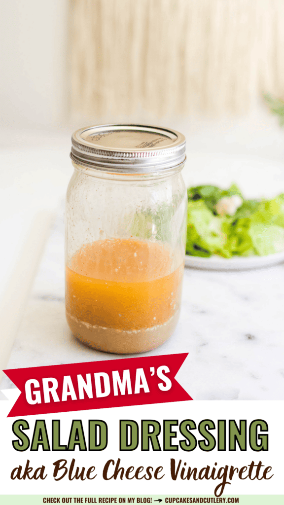 Text: Grandma's Salad Dressing aka Blue Cheese Vinaigrette with a jar of homemade salad dressing on a table.
