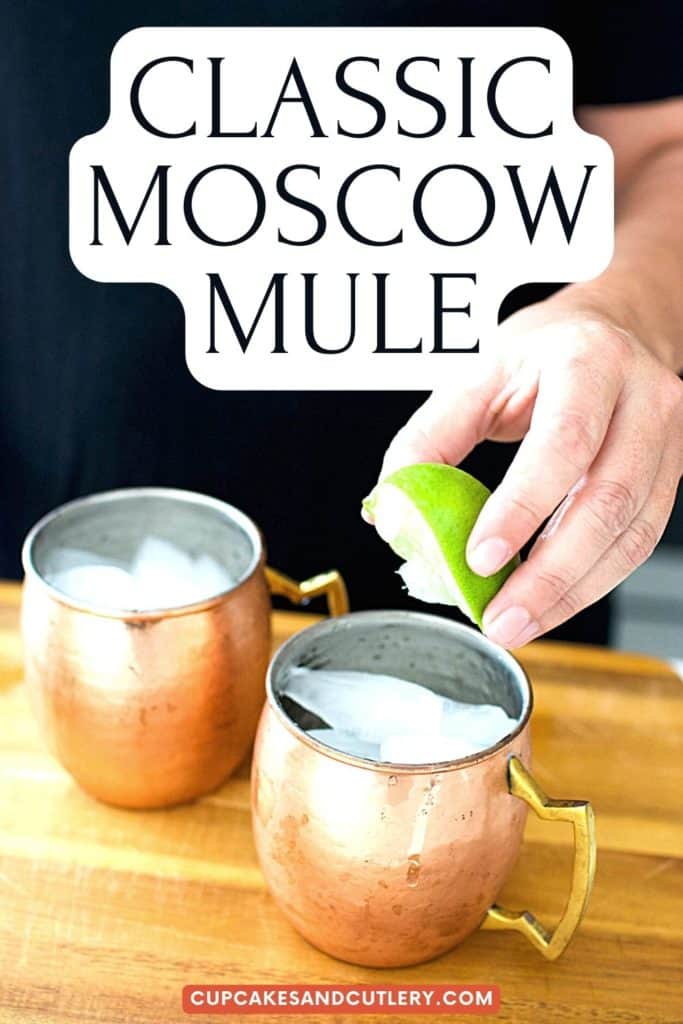 Squeezing fresh lime into a copper mule mug.